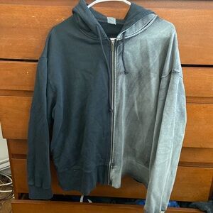 Two toned black and grey hoodie with full zip and pockets. Very warm